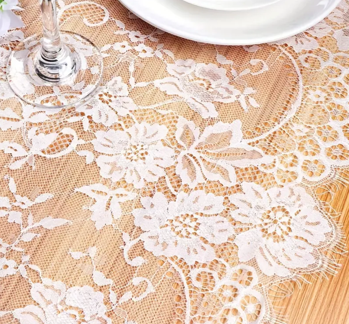 Add a whimsical touch to your dining table with our vintage-inspired white lace table runner! ✨

Its authentic coquette design brings a playful, charming touch to any meal, effortlessly elevating your tablescape 🌸 Perfect for the hosts who have a love for the aesthetics!&nbsp;

Hot Style Tip: It's giving rustic chic or garden party weddings &amp; events 🍽️💐

Dimensions: 28" x 120"&nbsp;📏